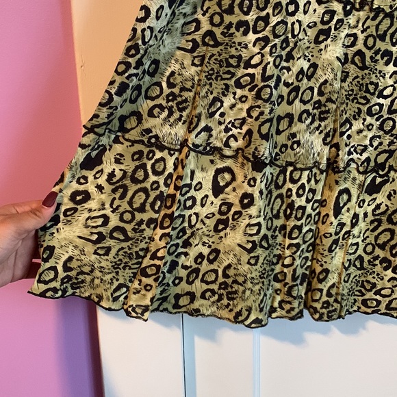 We have a Off colored Green Cheetah Print Skirt. - Picture 2 of 3